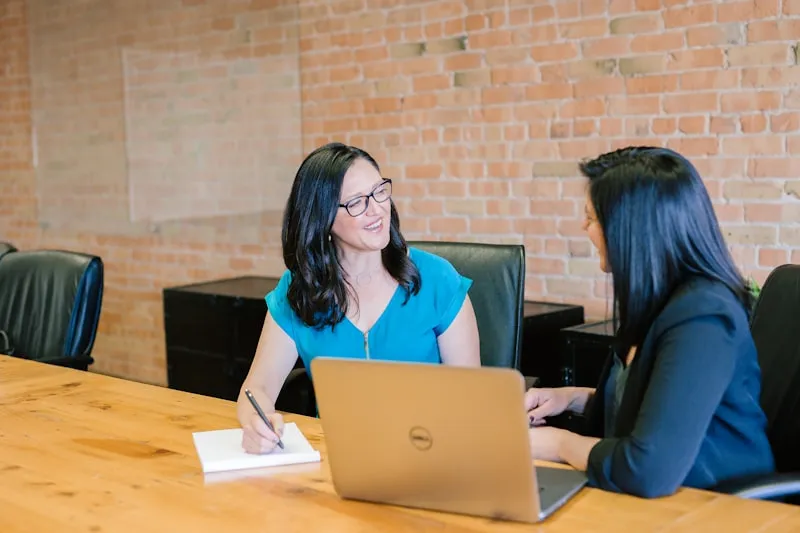 Healthcare professionals at a long-term care facility discussing staffing partnership solutions