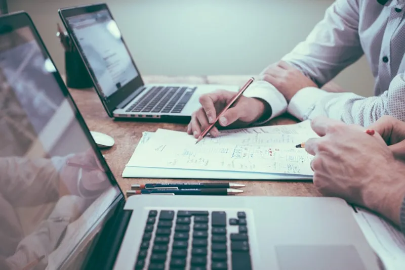 A family reviewing Ontario Passport funding documents with a support coordinator